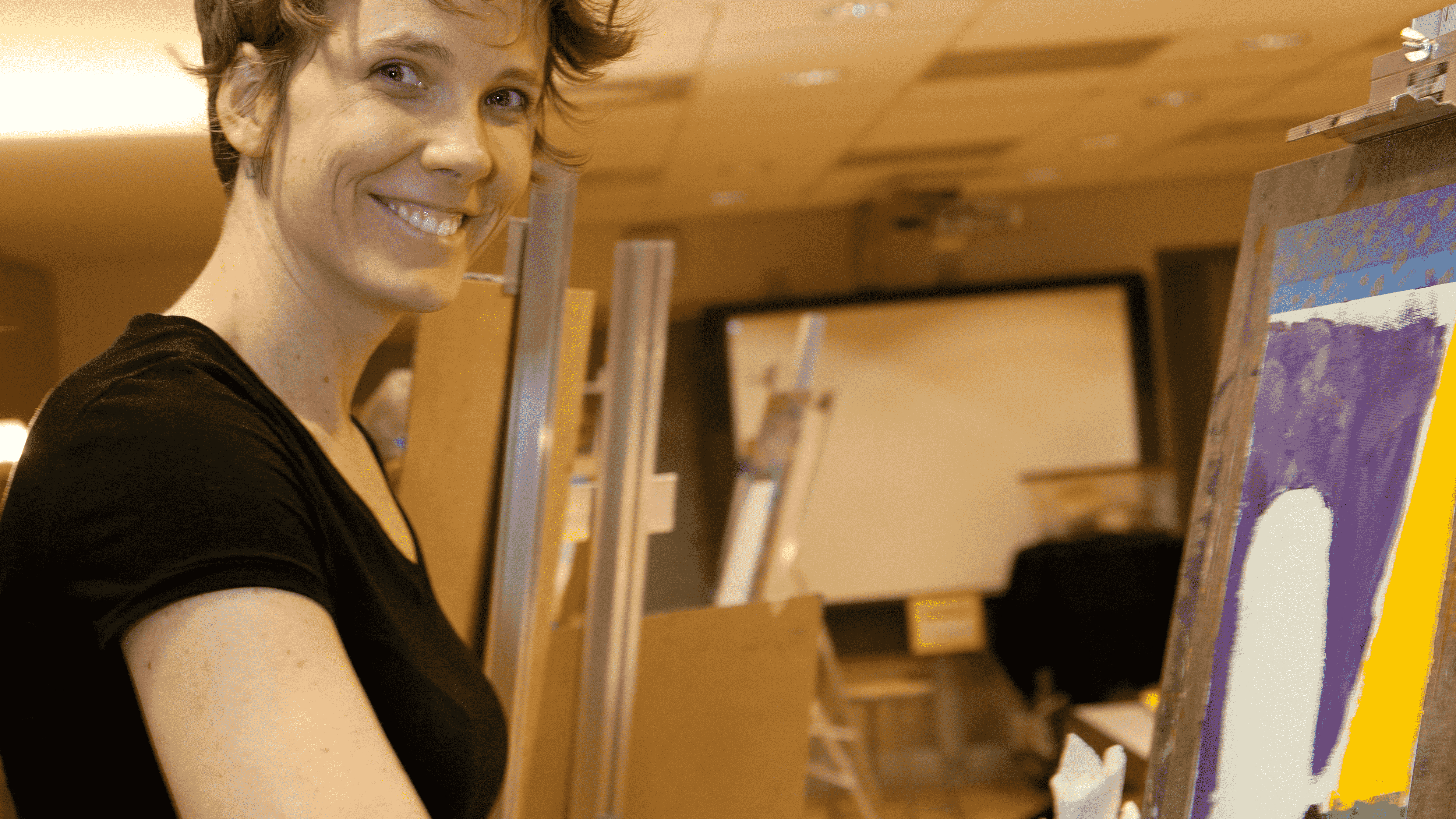 Image of a woman at an adult art class at the Denver Art Museum