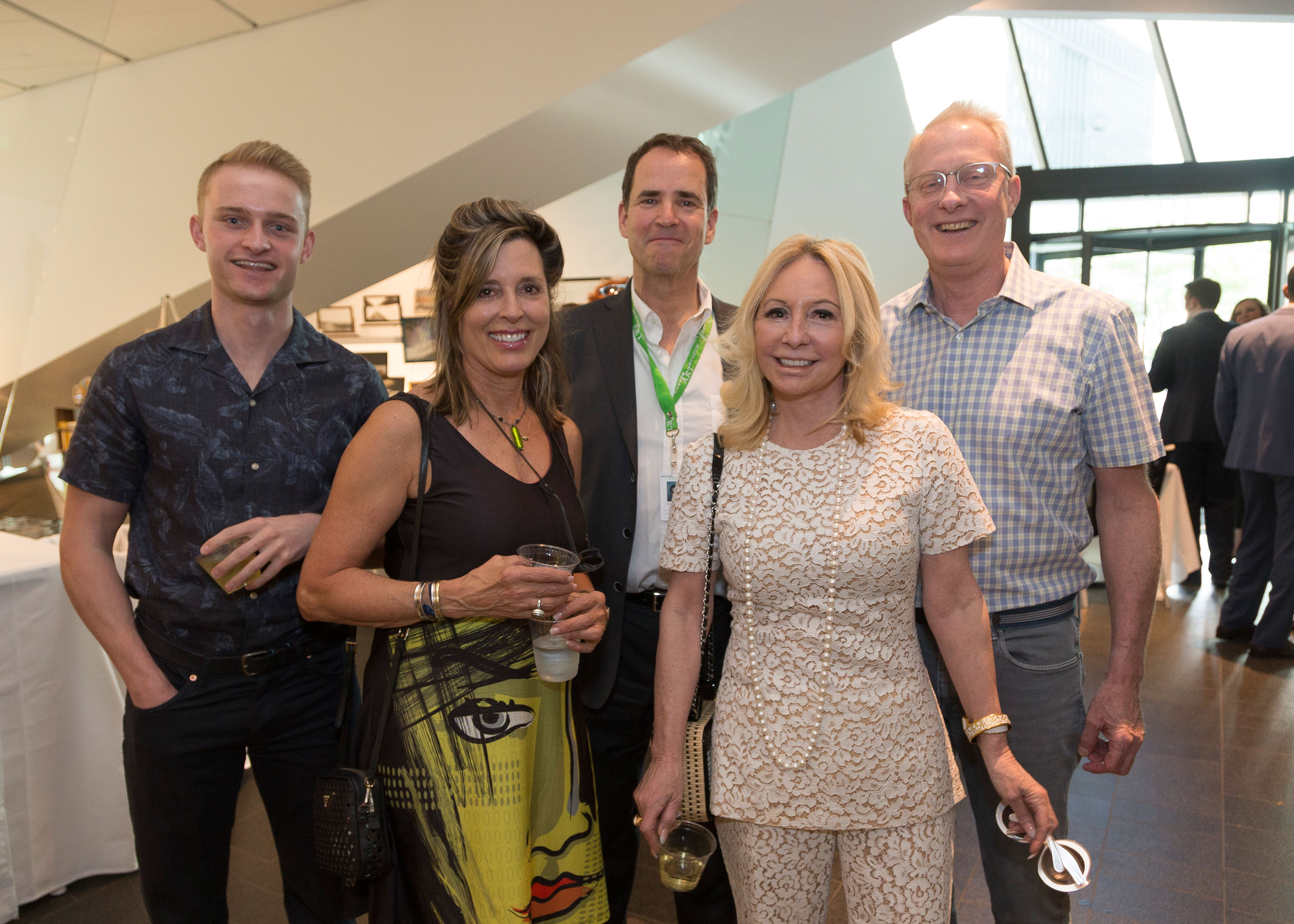 Guests pose for a photo in the DAM's atrium