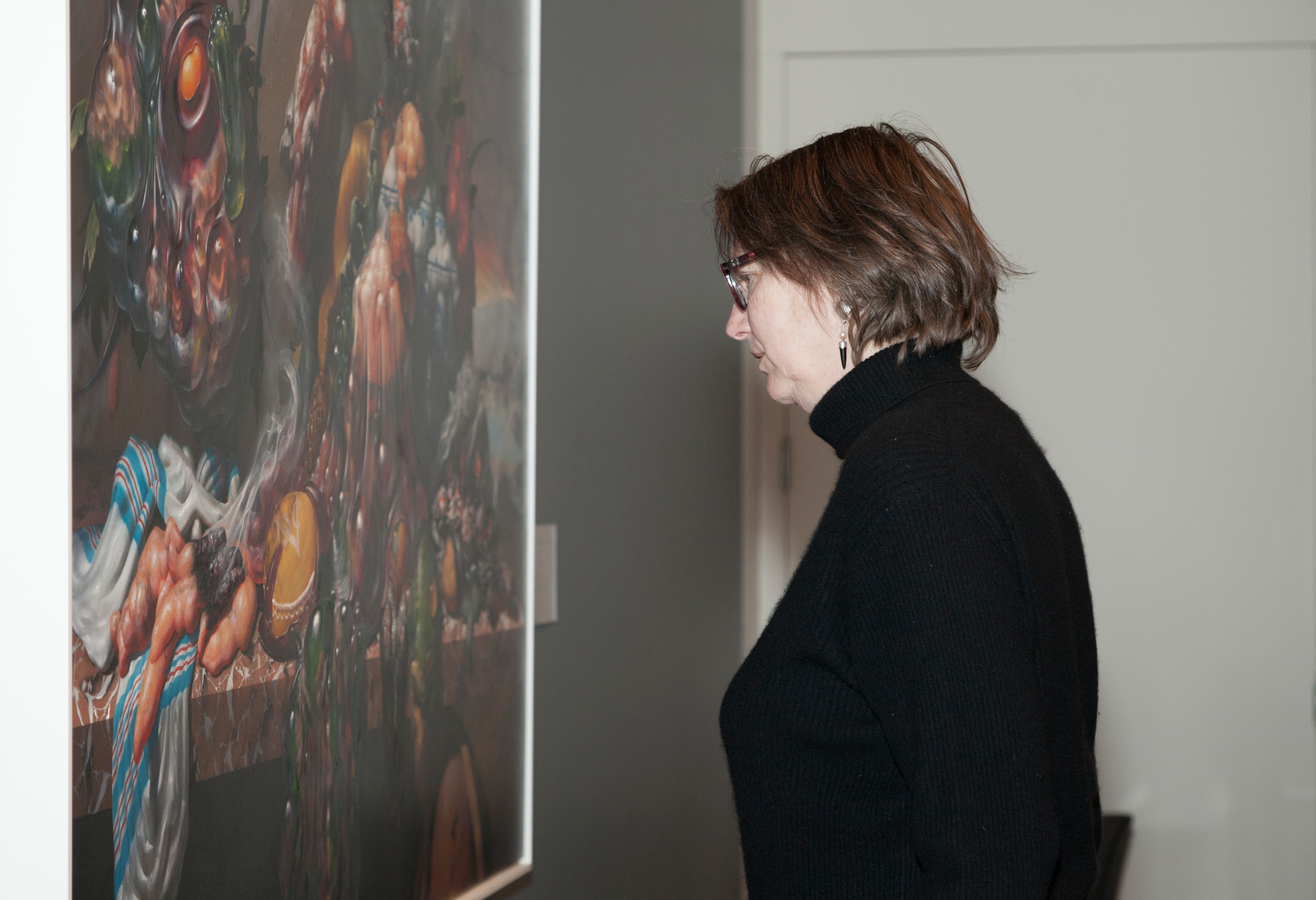 Woman gazing at painting