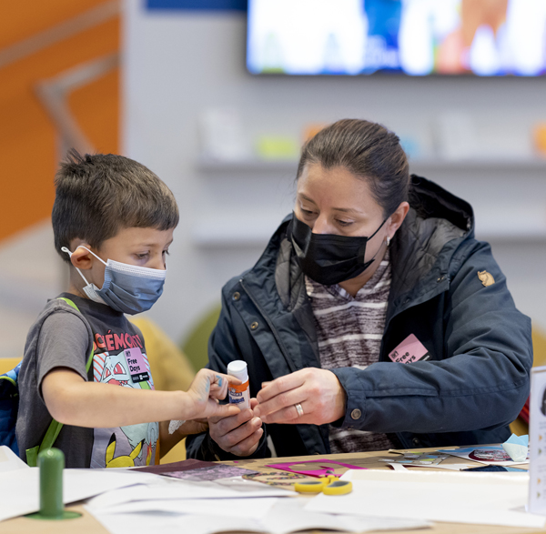 Mother and child working on an arts and crafts project