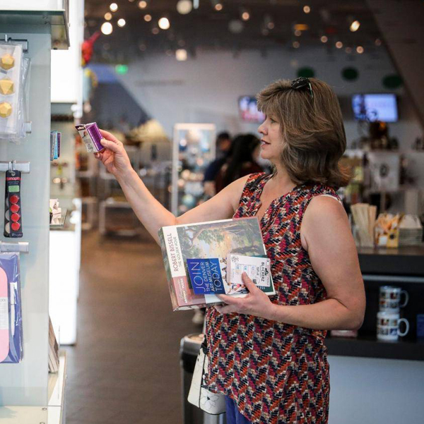 Woman browsing in the museum's shop