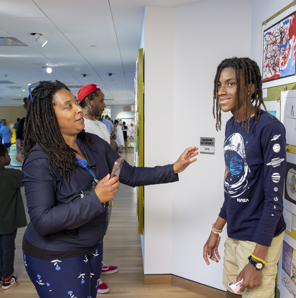 Mother and son in the showcase galleries