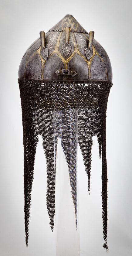 A slightly conical helmet with a chainmail veil, a spike holder on top, and three plume holders.
