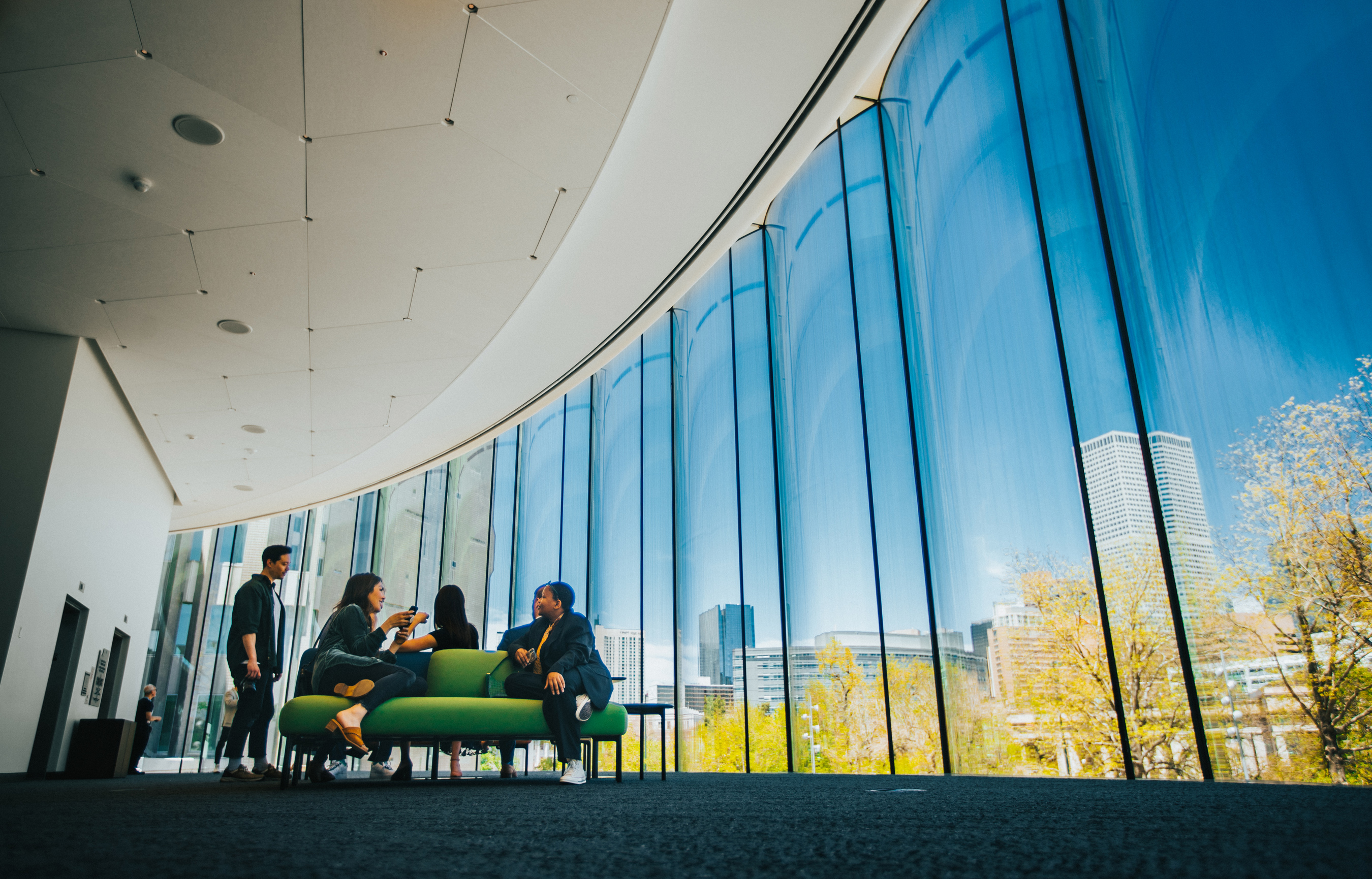 Group of visitors in a large open pavilion