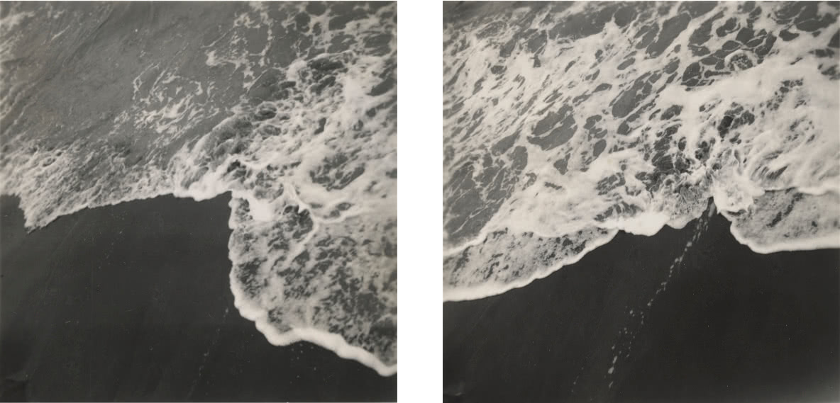 A set of two black and white photographs of foamy ocean water lapping onto a black sandy beach. The images vary slightly.
