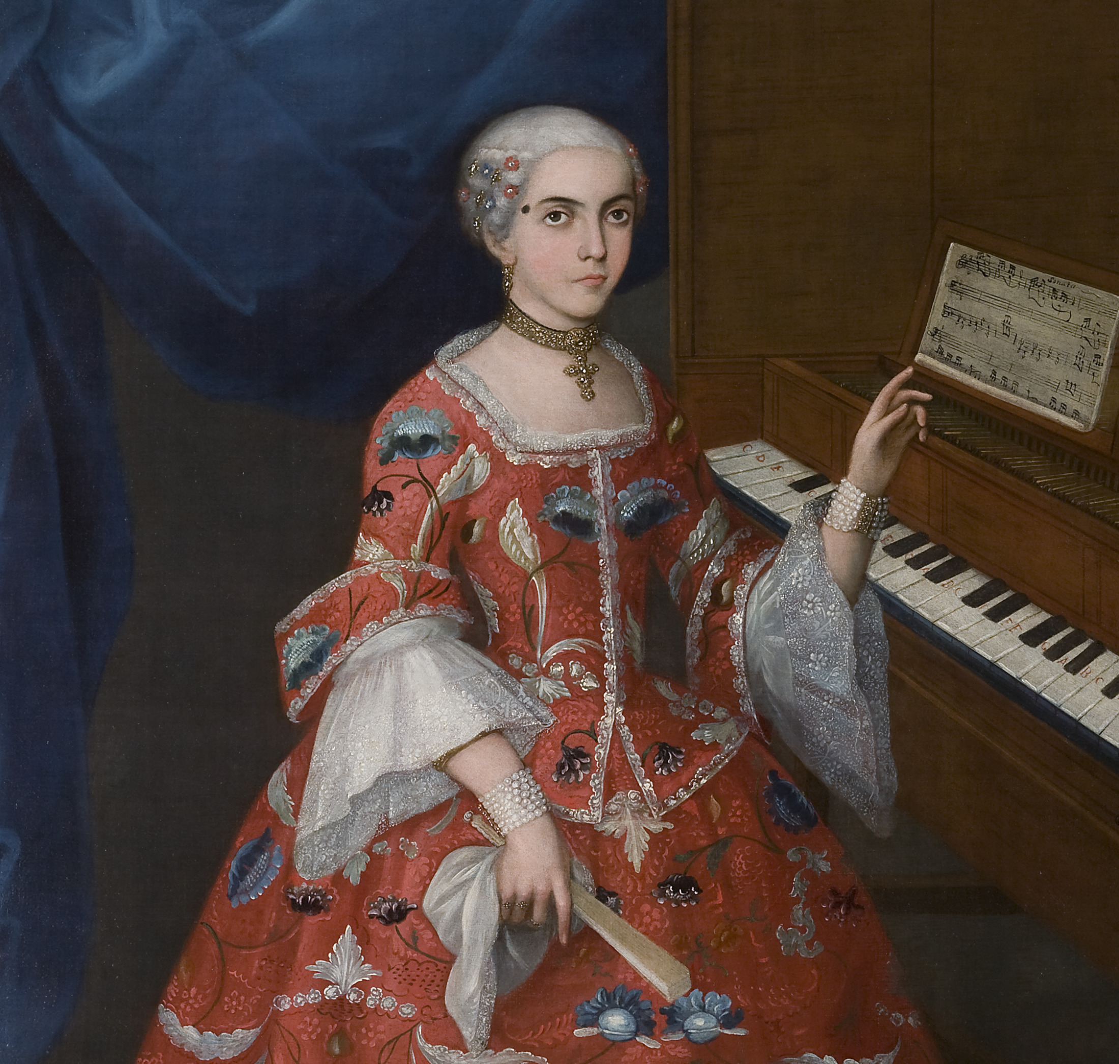 Detail of a portrait of a young woman wearing a red dress standing by a harpsichord.