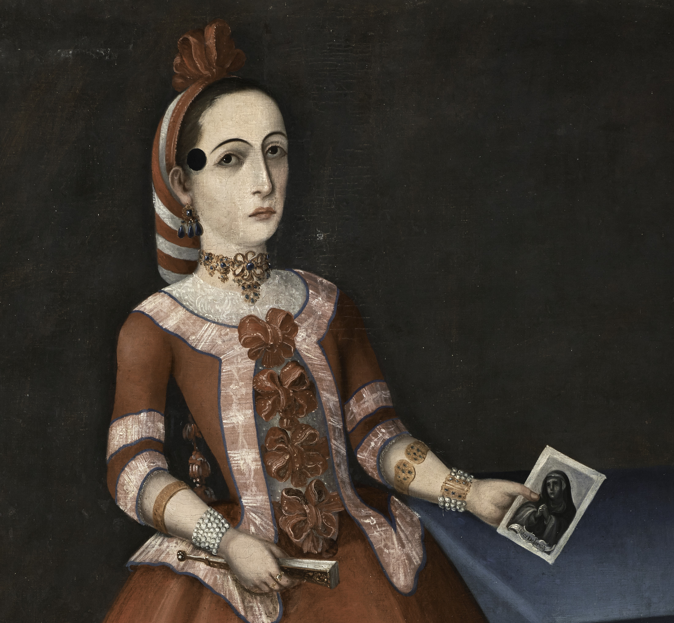 Detail of a portrait of a noblewoman wearing a red dress with an extravagant gold necklace