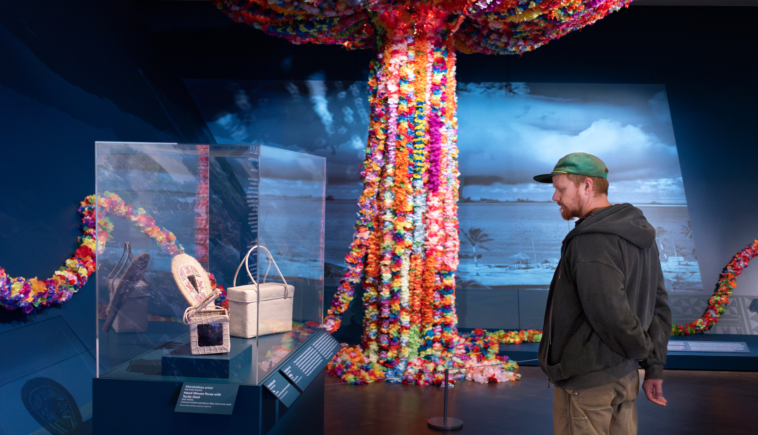 Man in Islands Beyond Blue exhibition