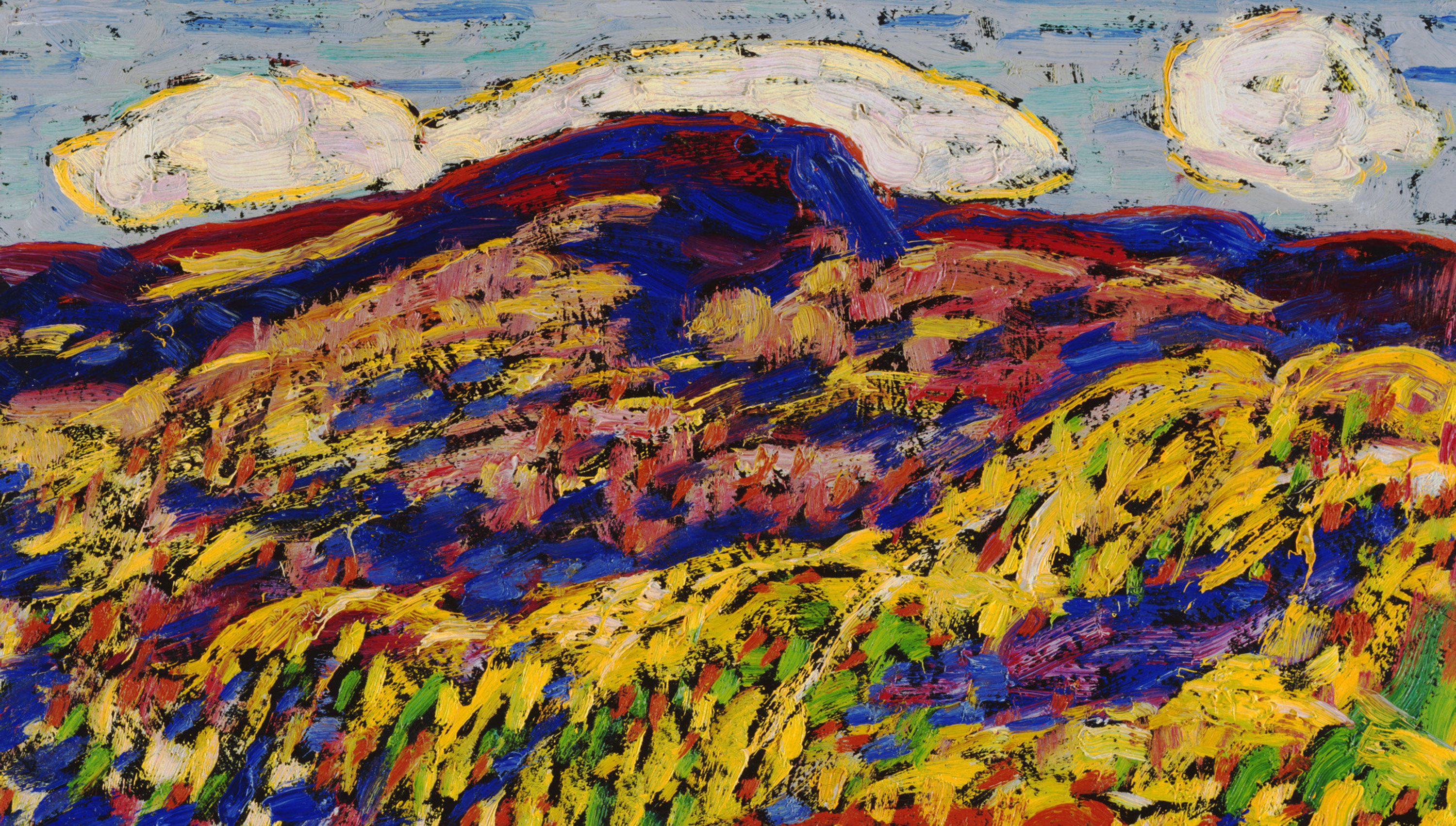 Brightly-colored painting of a mountain range with a blue sky in the background and wavy yellow grasslands in the foreground