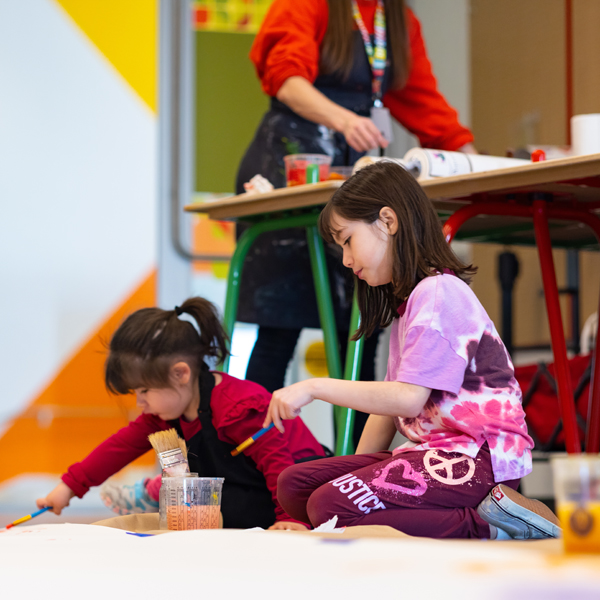 Two young girls making art in the Creative Hub classrooms