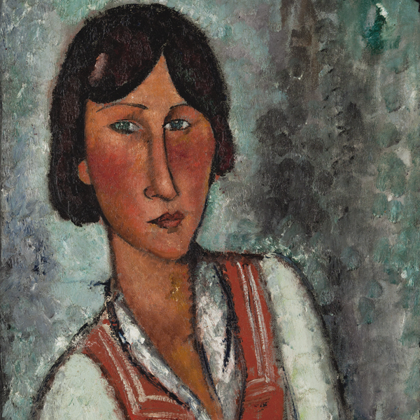 Portrait of a woman in a white top with red collar