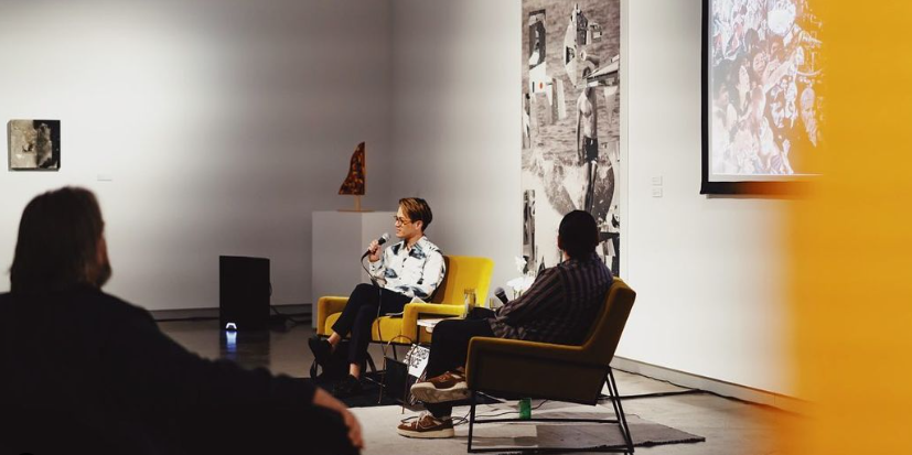 Curator giving a discussion in the galleries