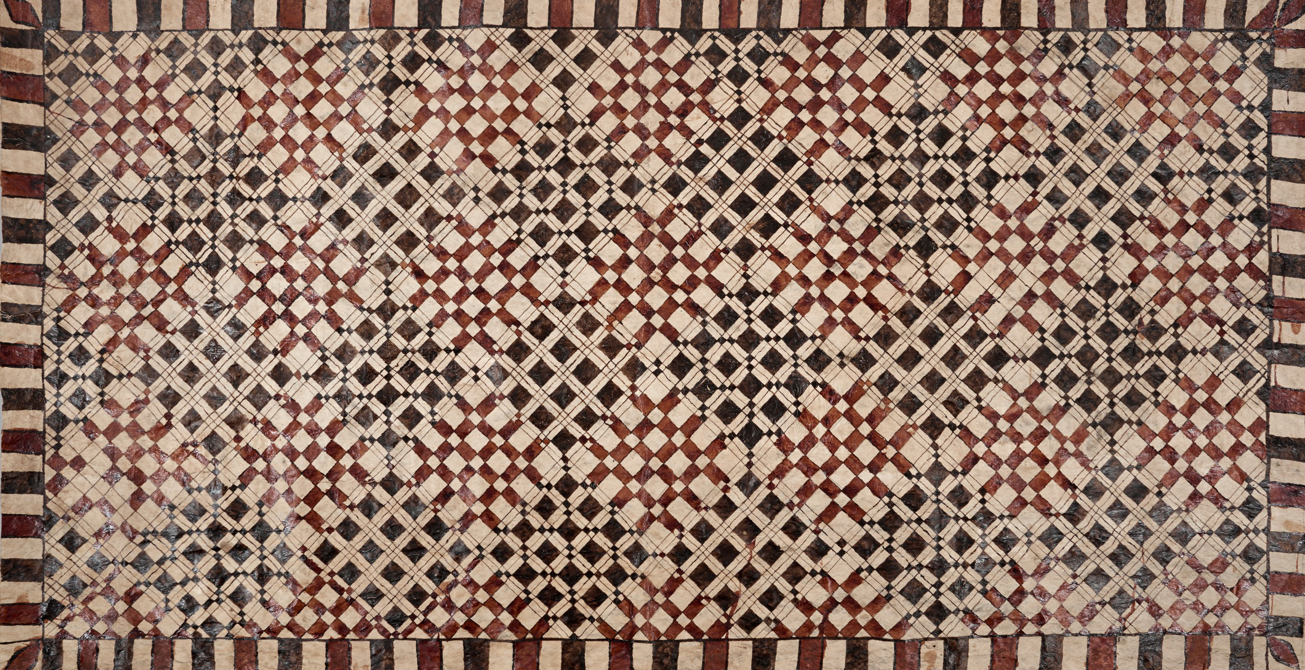 Red and black square patterned textile