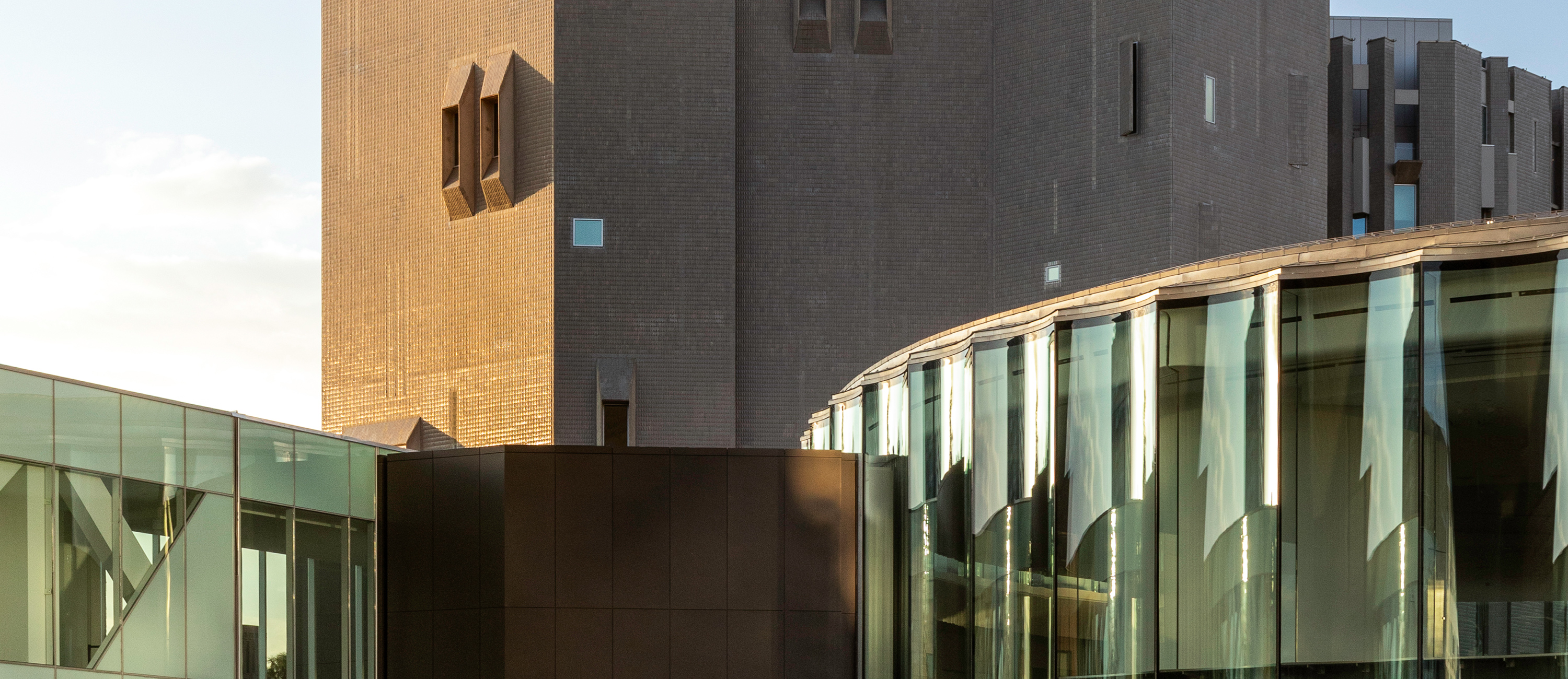 Exterior view of the Martin Building, Sie Welcome Center, and connecting bridge to the Hamilton Building