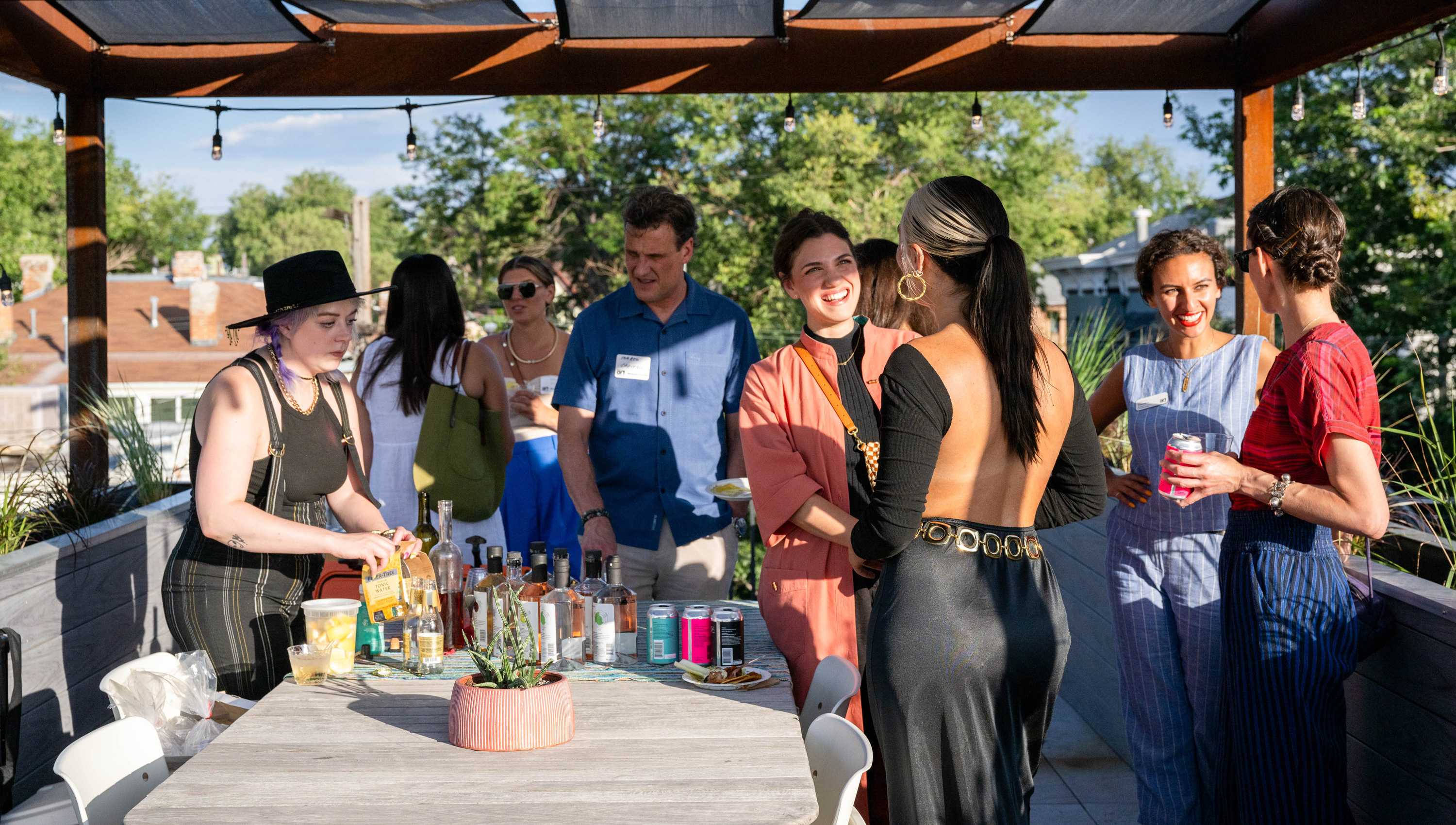 Group of CultureHaus members mingling outdoors