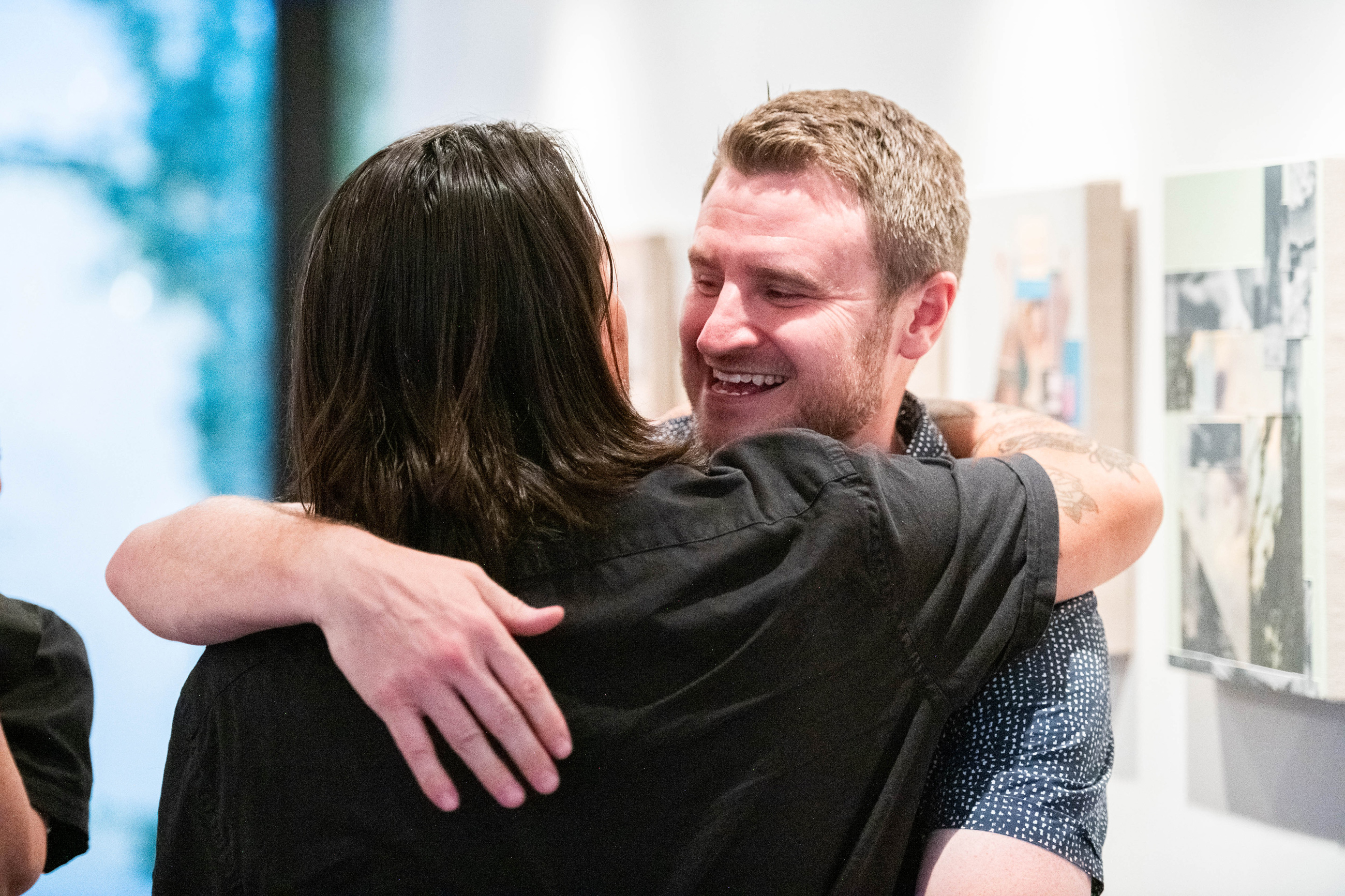 Two men embracing in a hug