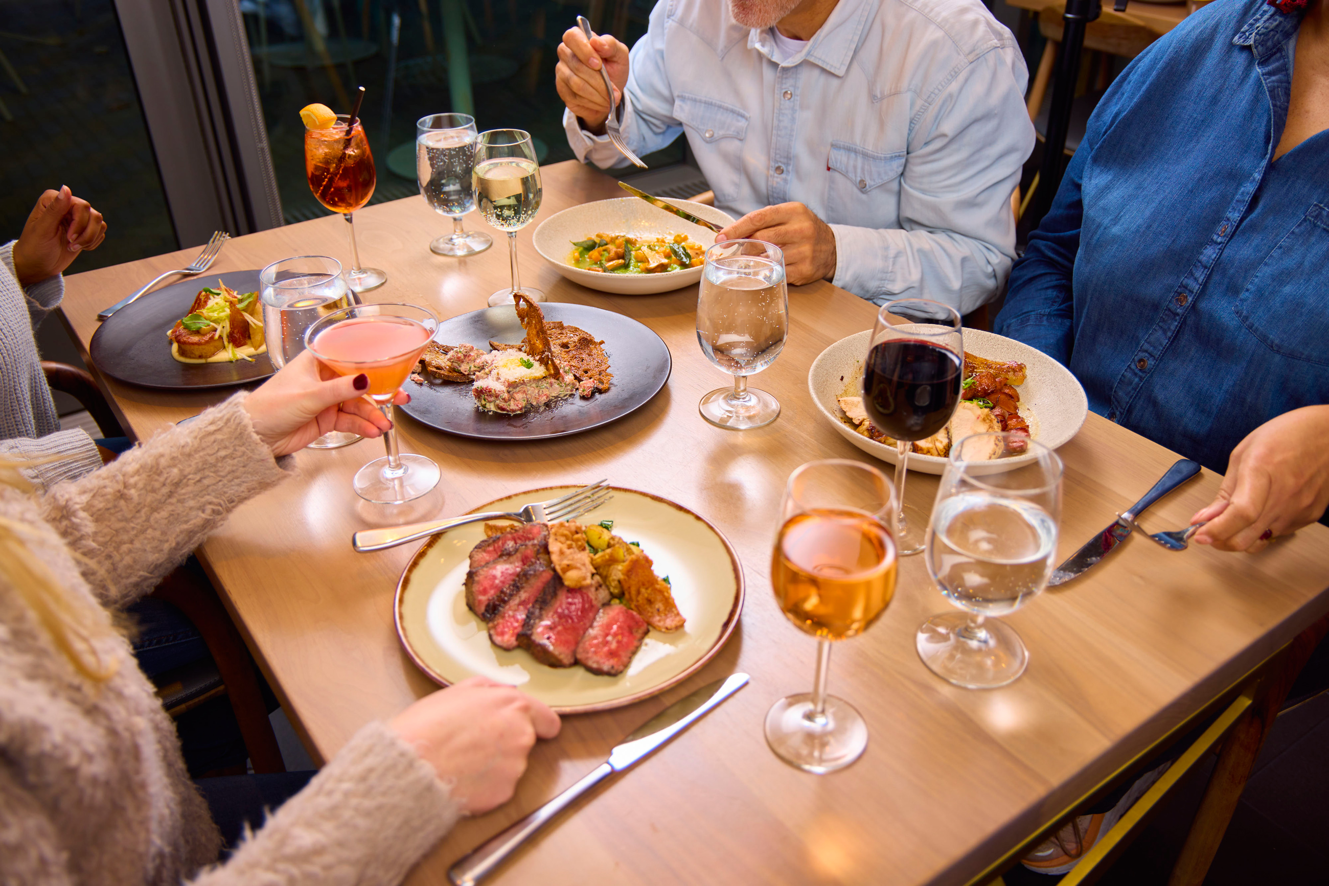 Group of visitors enjoying brunch at the Ponti