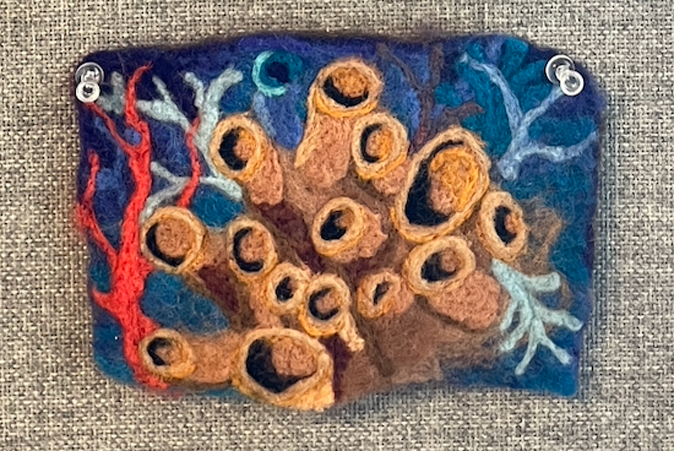 Wet felting artwork resembling a coral reef