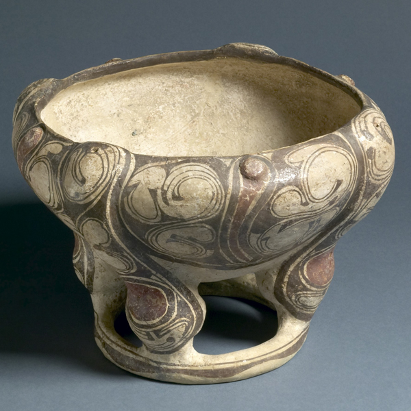 Ceramic bowl-shaped vessel adorned with South American designs
