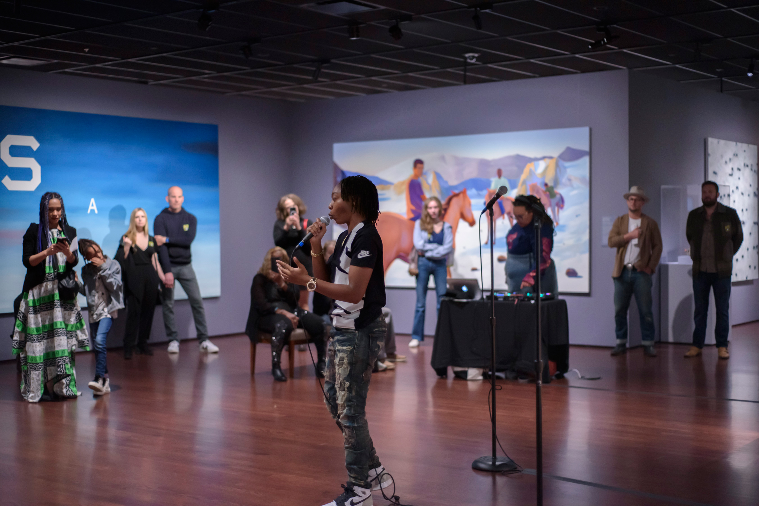 Performers in the gallery during an Untitled after hours event