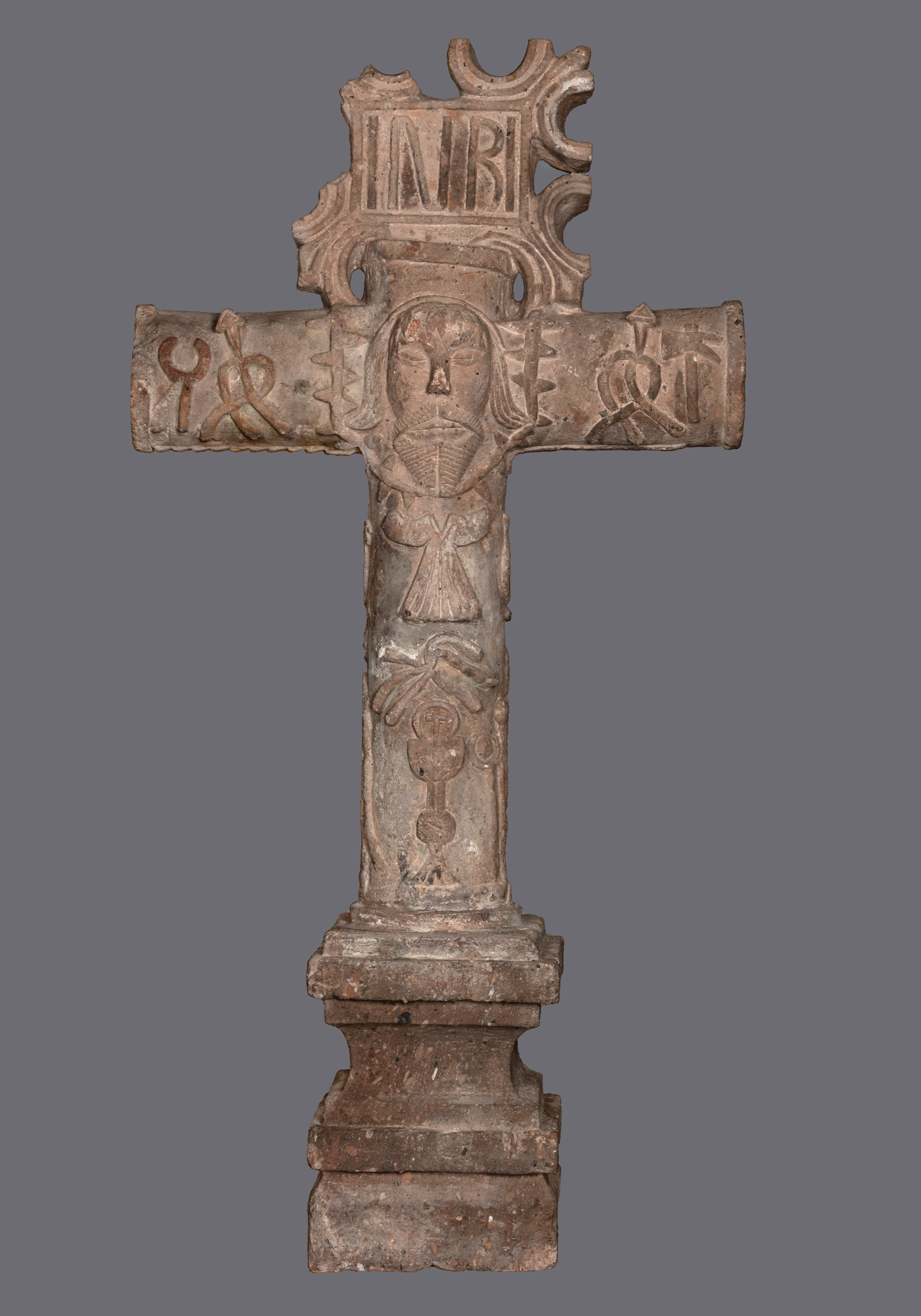 a carved stone cross