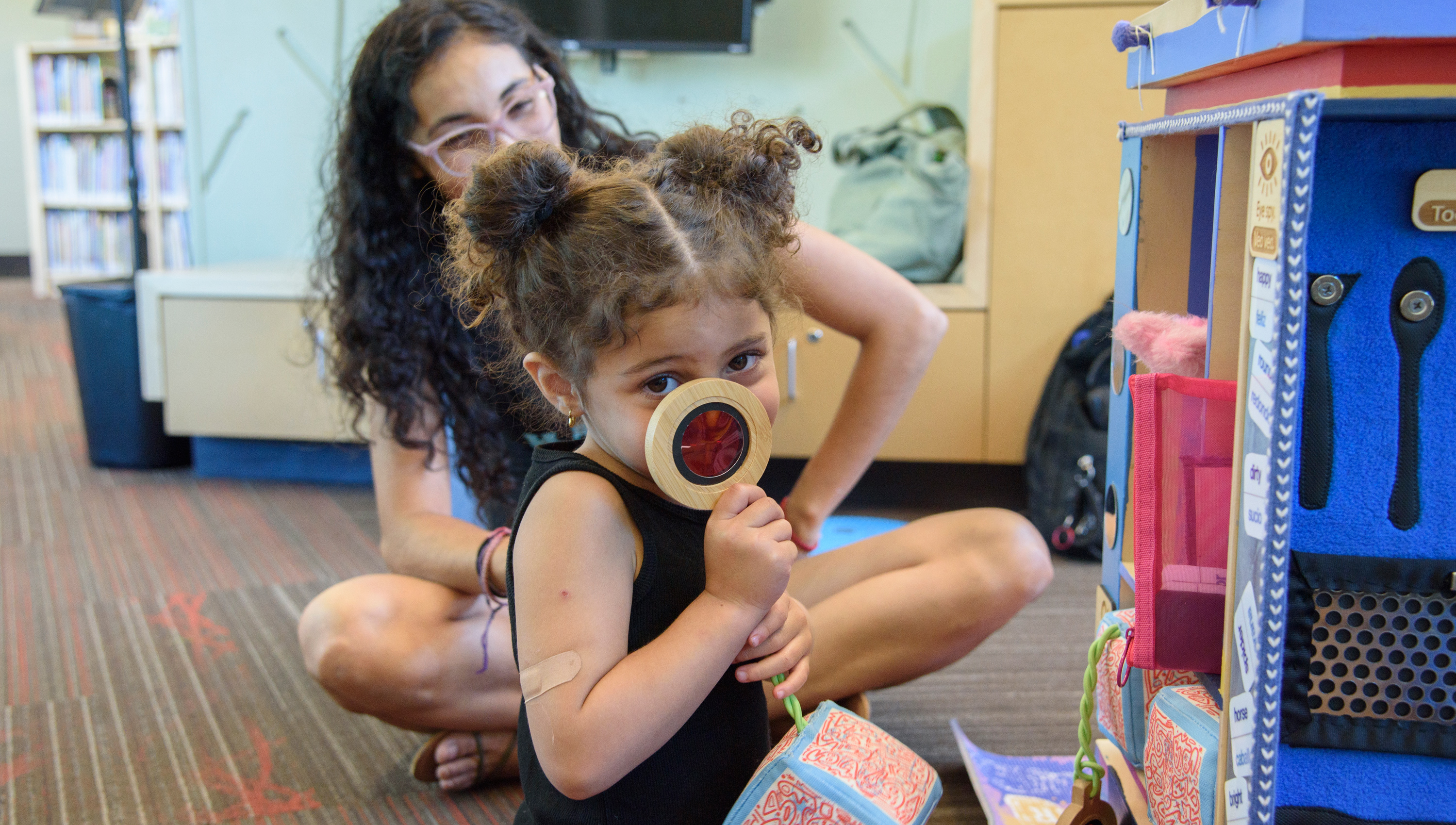 Mother and daughter playing in the museum's creative hub