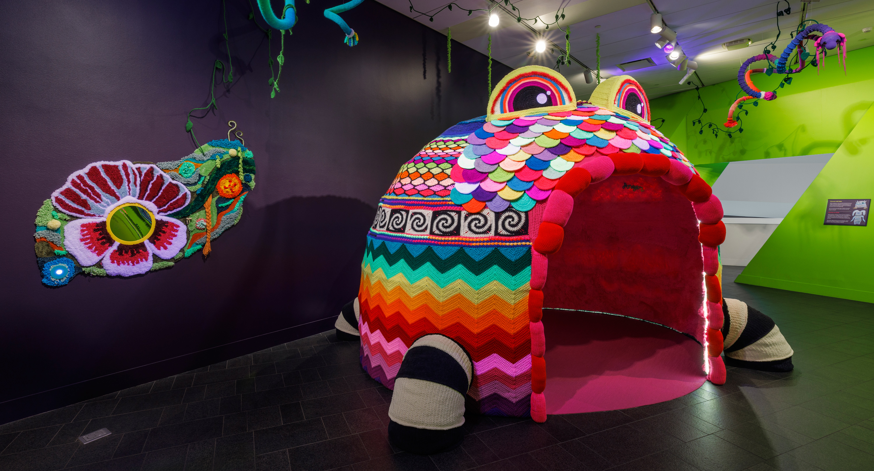 Gallery view of The Tangled Self, featuring a large monster-shaped small room guests can walk into