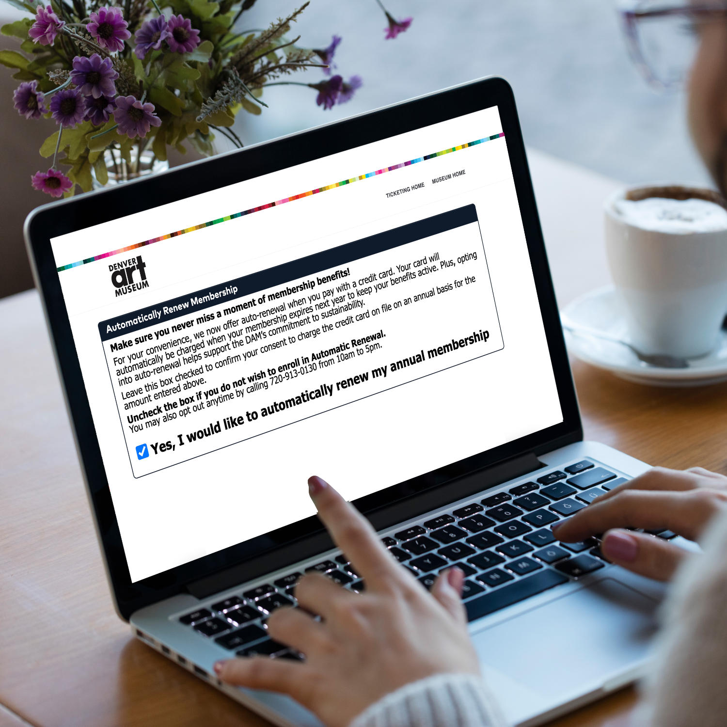 A laptop screen open to the autorenewal page for members of the Denver Art Museum.