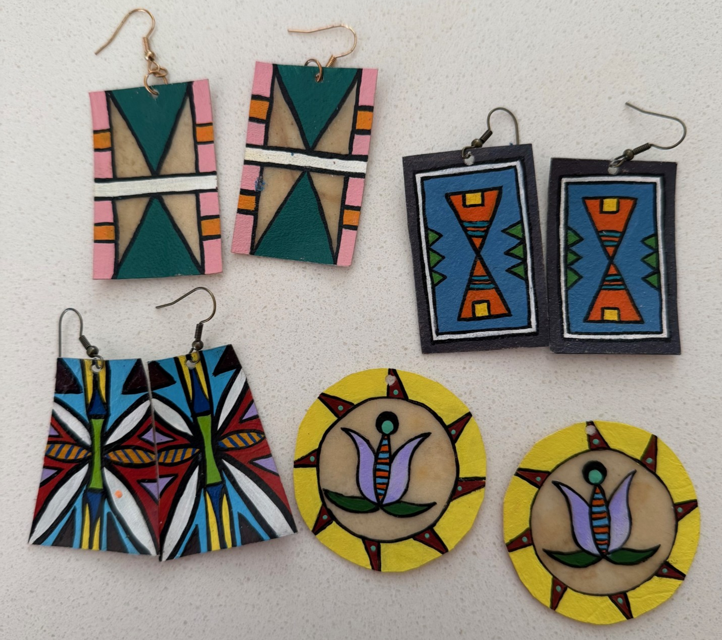 Examples of patterned parfleche paintings