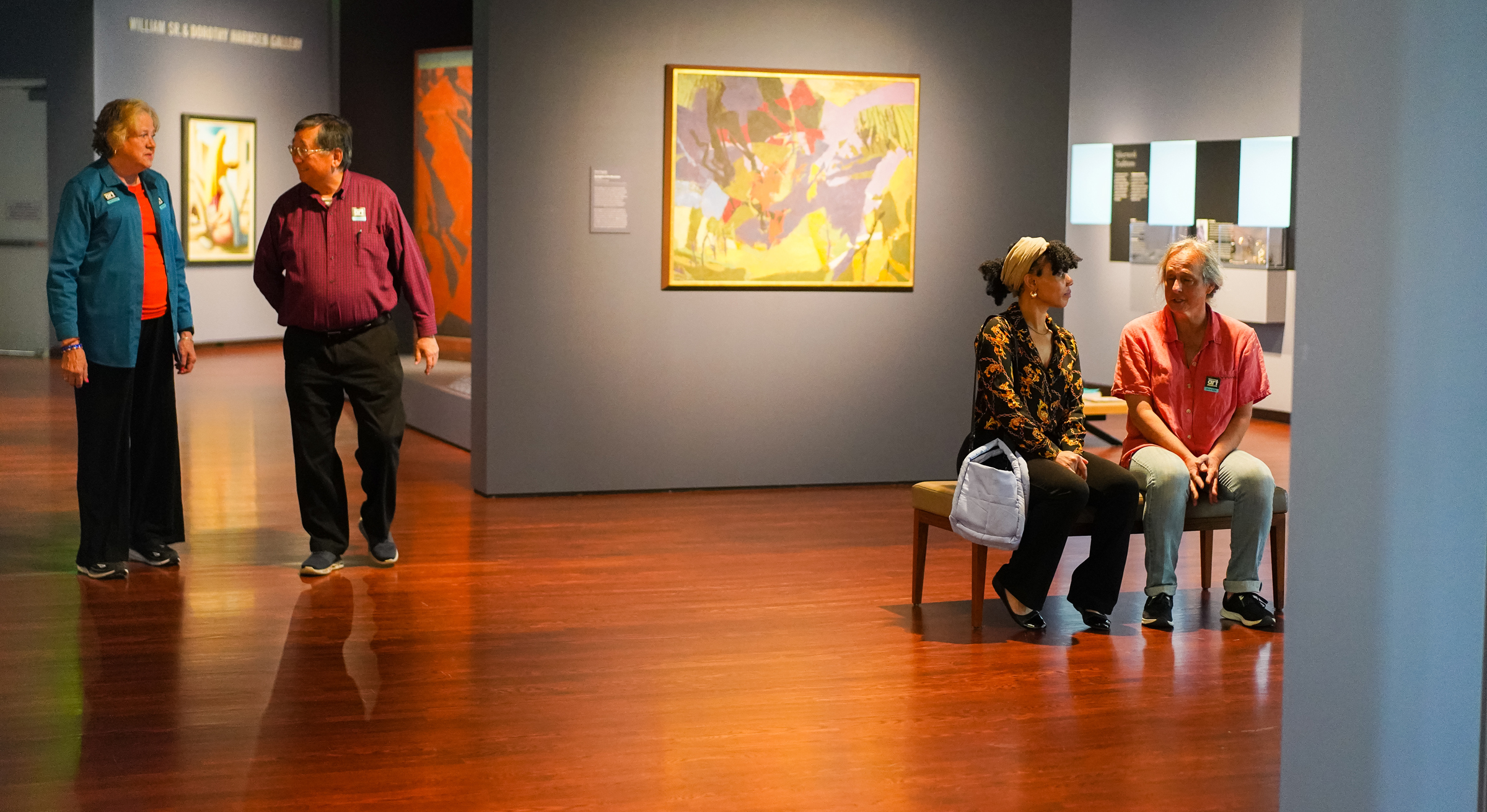 Guests mingling and meandering through the galleries