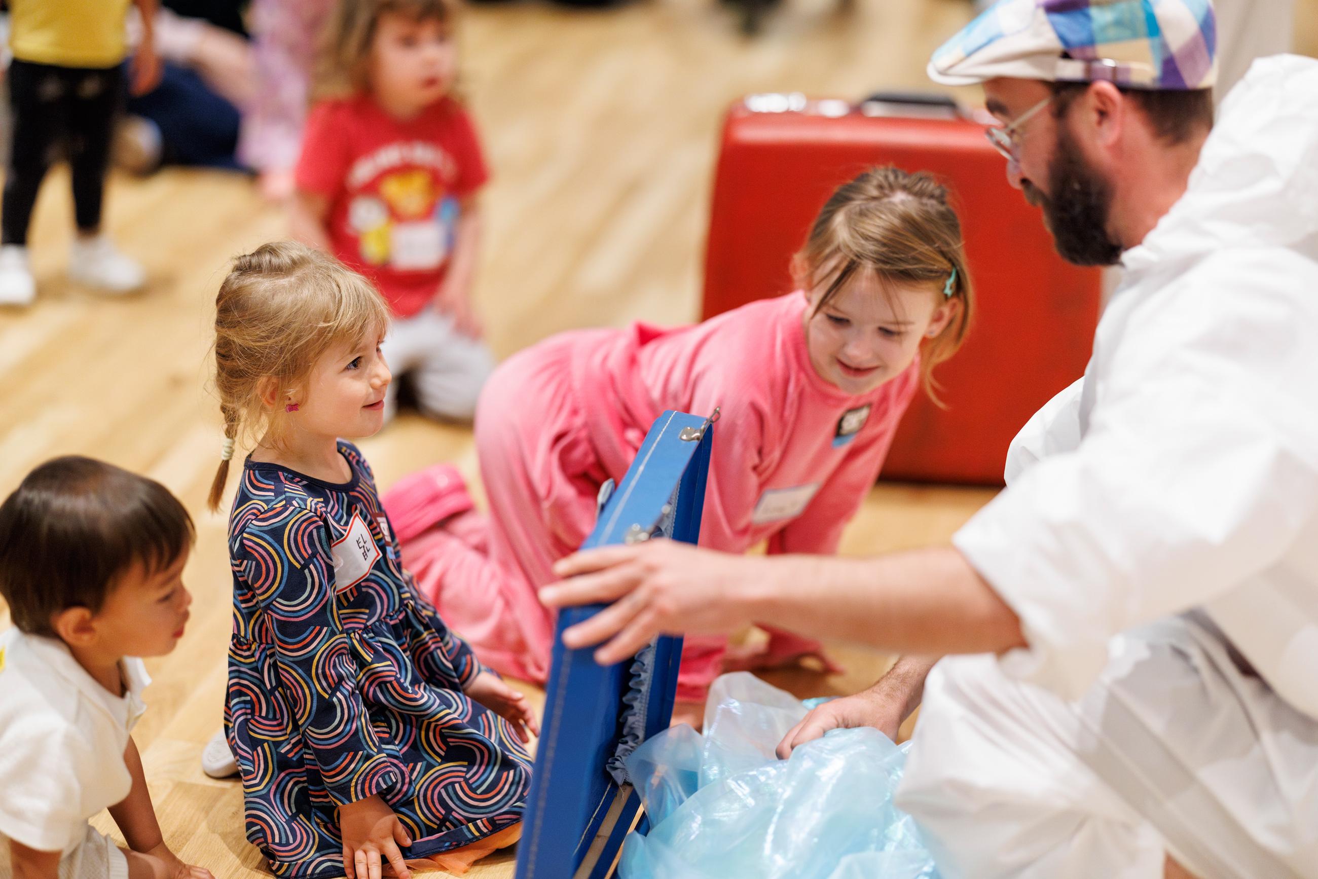 Man leading an activity for children at a Create &amp; Play event
