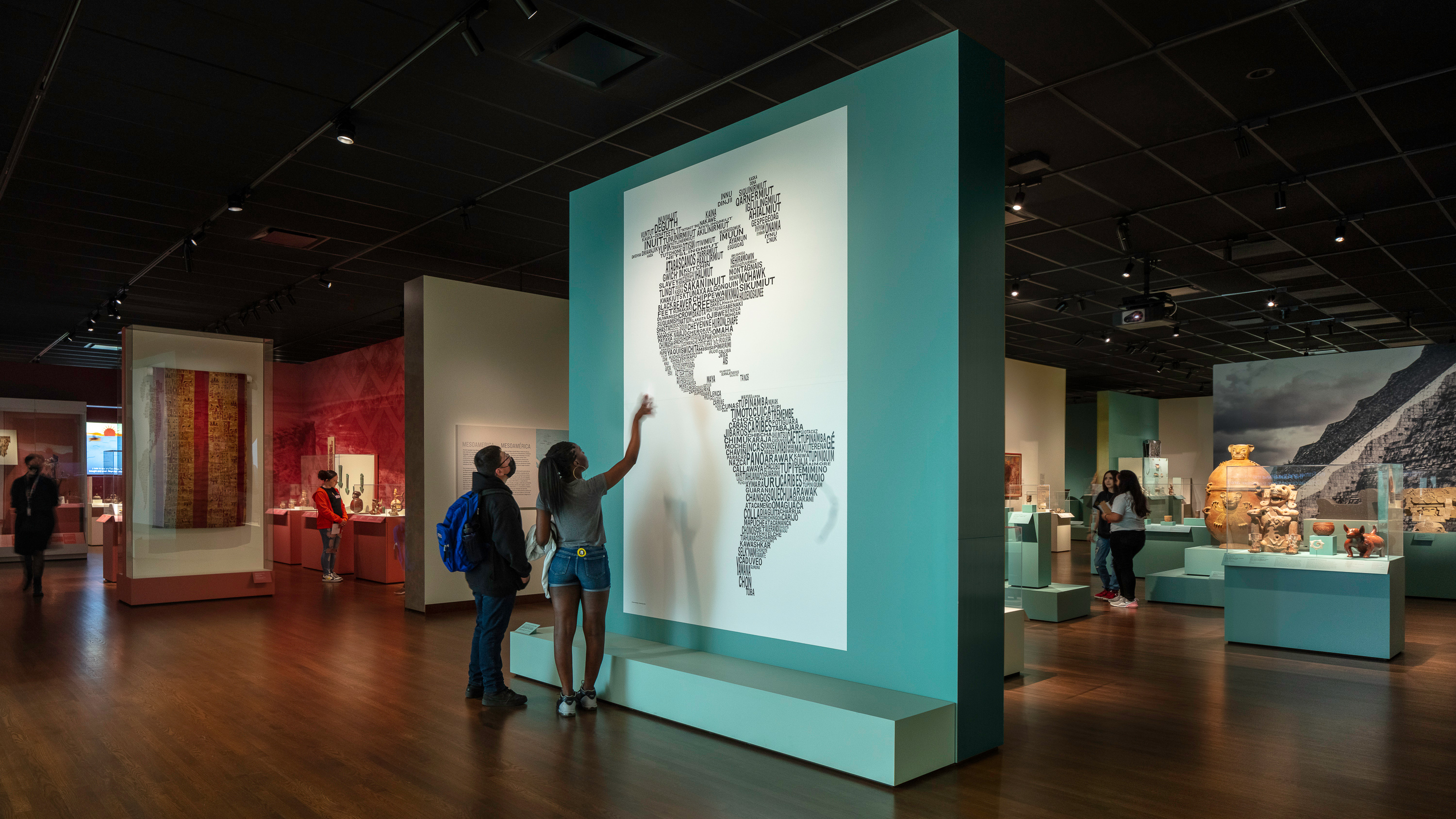 Wide shot of visitors looking through the galleries