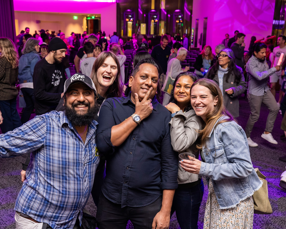 a group of people posing together