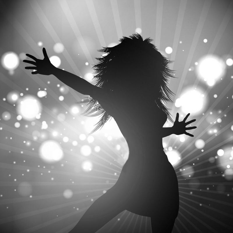 Black and white silhouette of a female singer under stage lights