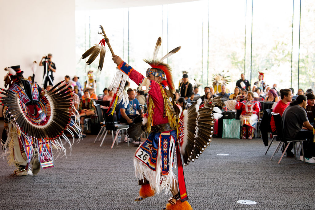 Indigenous performers dancing during a previous Powwow event at the DAM