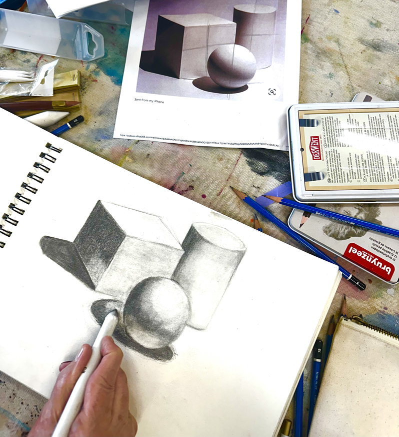 Hand drawing geometrical shapes inspired by a photograph reference point