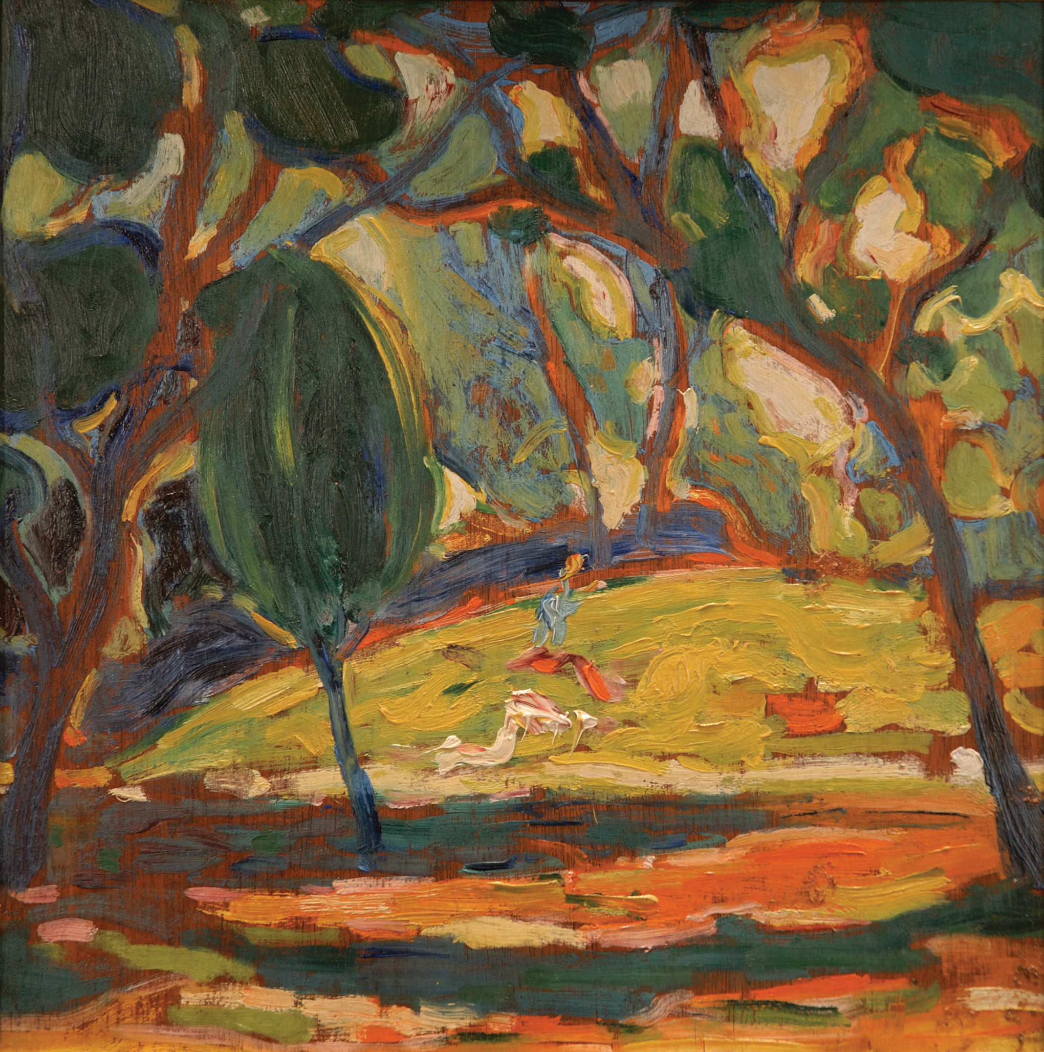 Autumnal forest landscape with a figure in motion in the center of the frame