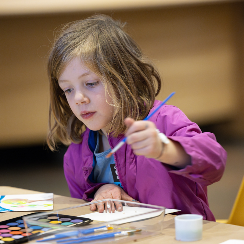 Young girl painting in the Creative Hub
