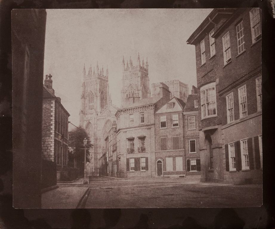 a black and white photo of buildings