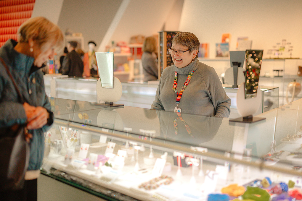 Two women shopping in the museum's shop