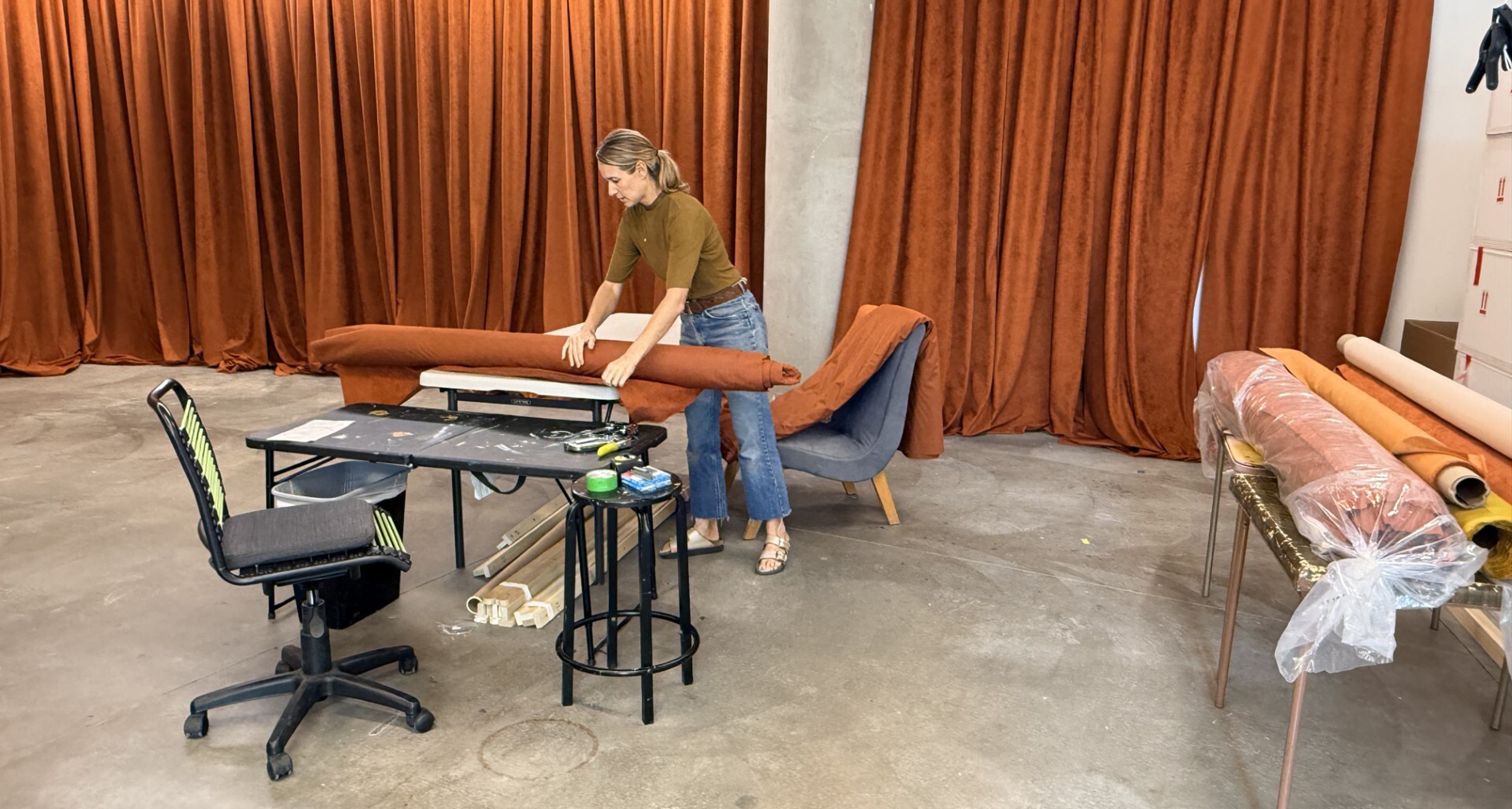 Laura Shill working in her studio on the Your Song installation