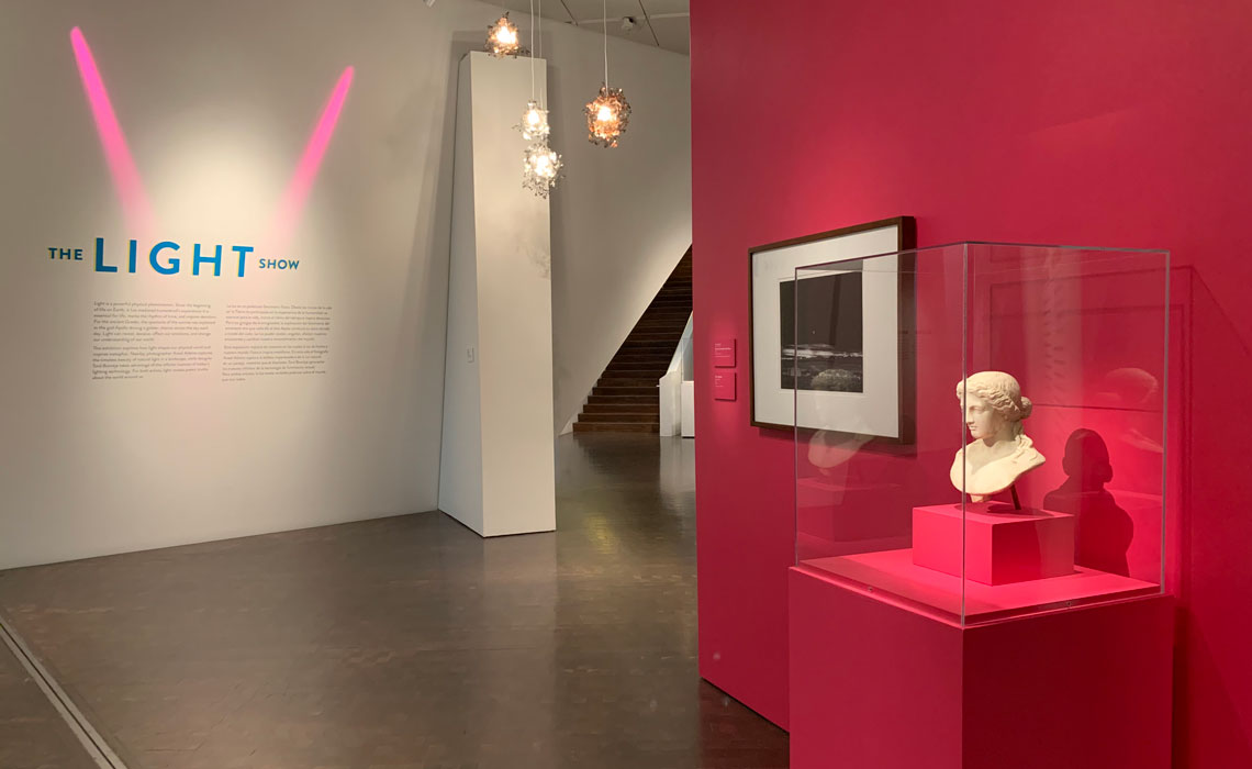 Gallery image of The Light Show with the bust of Apollo and a black and white photo in the background