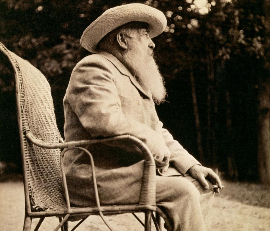 photo of Claude Monet sitting on a chair