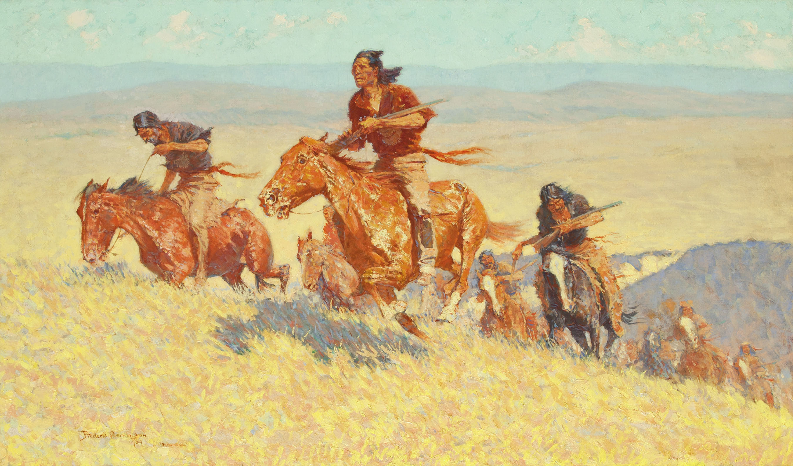Group of Indians on horseback cresting a hill