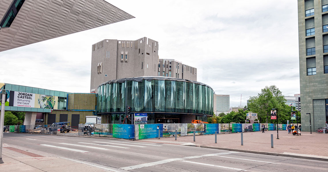 Photo of the Welcome Center and Martin Building under construction