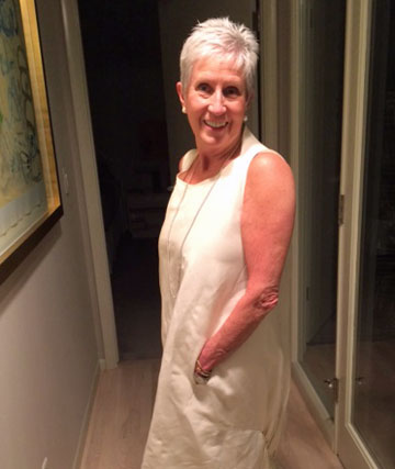 Susan Damour in a white Yohji Yamamoto dress