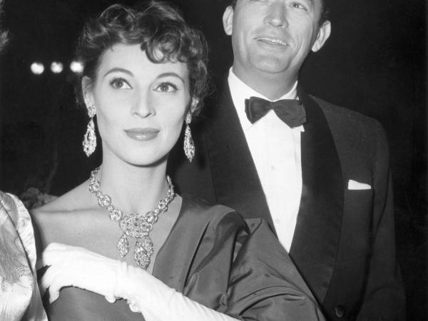 Veronique and Gregory Pec arriving to a movie premiere in formal attire