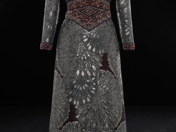 Gray haute couture runway wedding dress with bodice modification