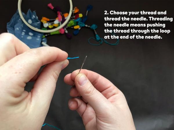 Step 2: Choose your thread and thread the needle. Threading the needle means pushing the thread through the loop at the end of the needle.