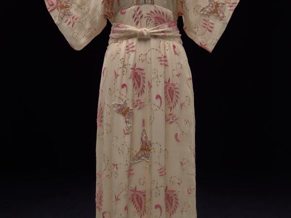 Soft cream colored dress with flower patterns